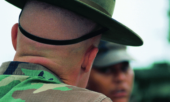 The back of a military officer’s shaved head
